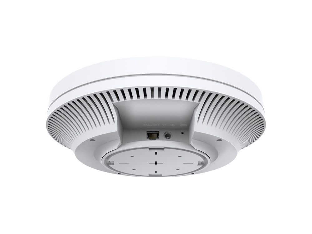 Onderkant van het TP-Link Omada SDN EAP670 WiFi 6 indoor access point met de stroomaansluiting en de ethernetpoort