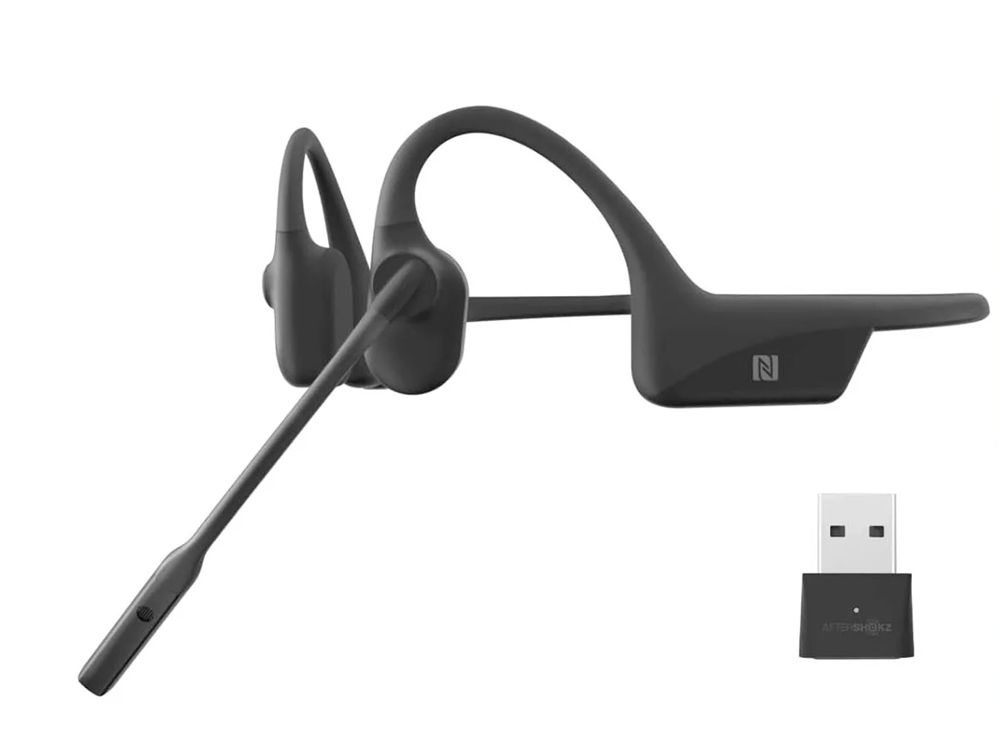 Linkerkant van de Shokz OpenComm2 UC stereo headset met USB-A Bluetooth dongle