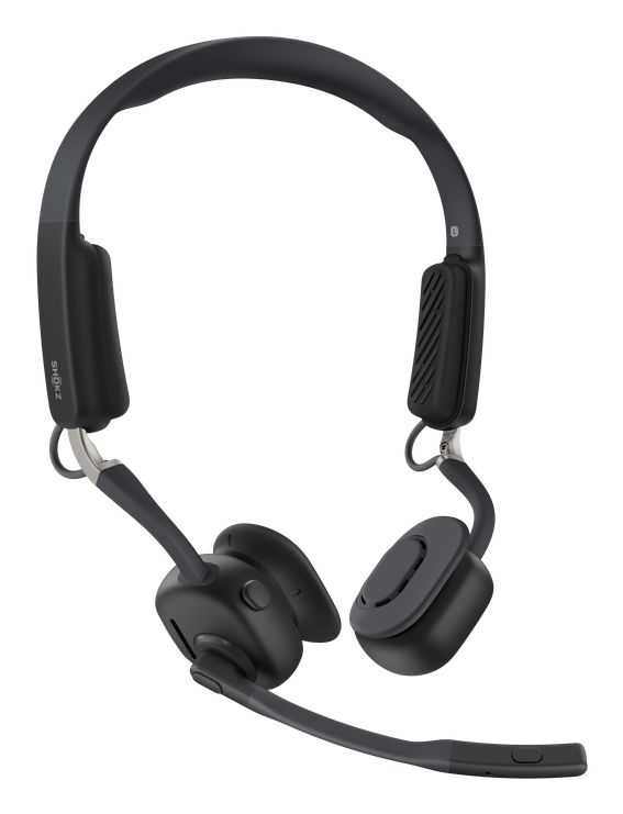 De professionele Shokz OpenMeet UC bone conduction en air conduction open-ear headset schuin van voren
