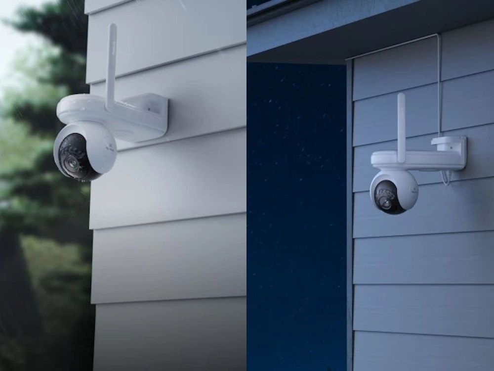 De draadloze Reolink B660-W 4K PT WiFi accu camera voor buiten twee keer aan een wand buiten geplaatst met zonnepaneel en draadloos