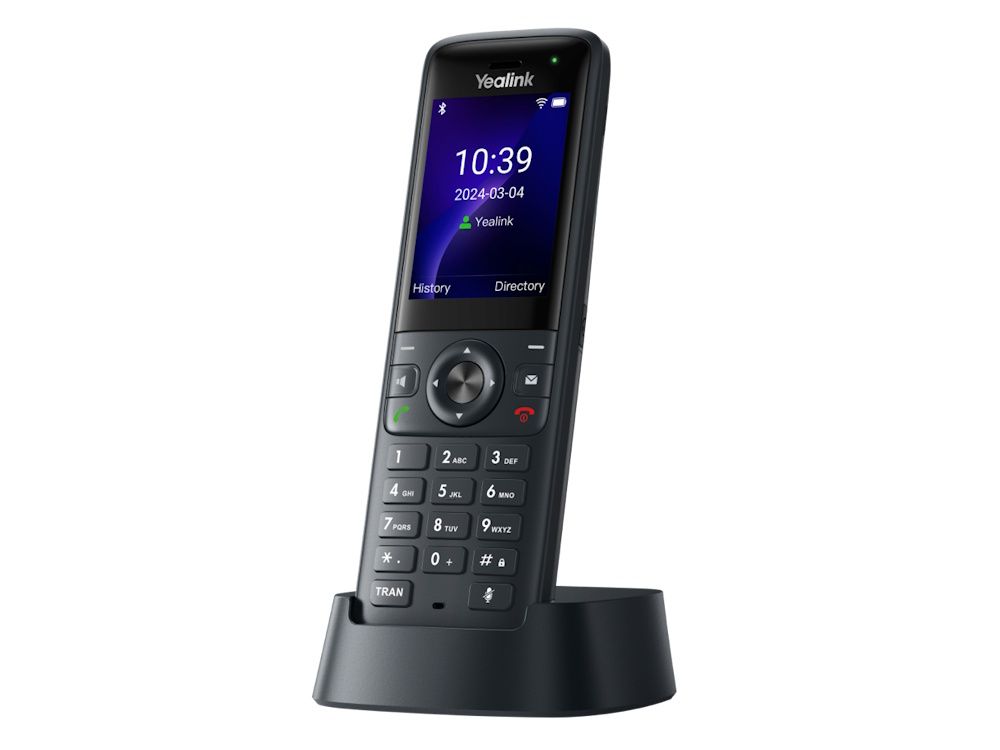 De zakelijke Yealink AX83H WiFi telefoon in het oplaadstation