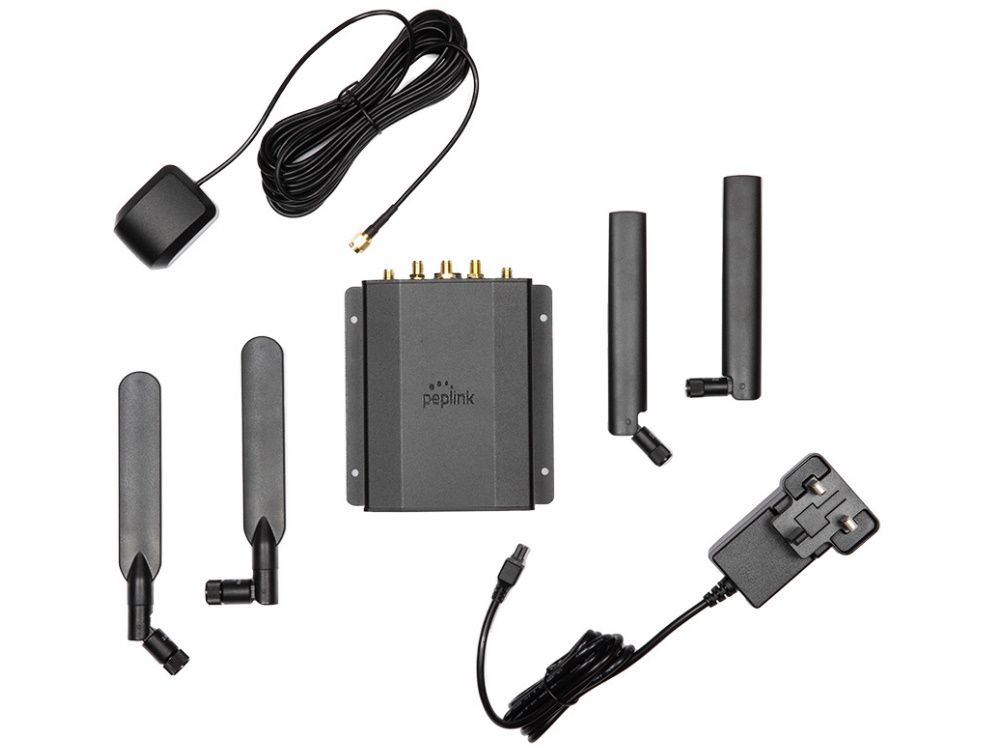 Verpakkingsinhoud van de Peplink MAX BR1 Mini LTE (HW3) 4G LTE router met voeding en antennes