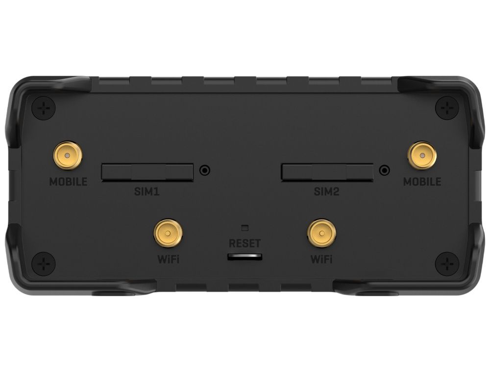 Zijkant van de Teltonika RUT951 PoE+ industriële 4G LTE router met alle antenne-aansluitingen en simslots zichtbaar